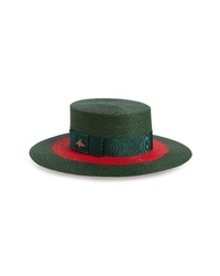 Темно-зеленая соломенная шляпа