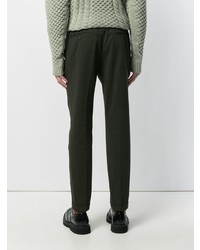 Темно-зеленые брюки чинос от Prada