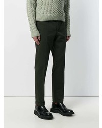 Темно-зеленые брюки чинос от Prada