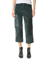 Темно-зеленые вельветовые брюки