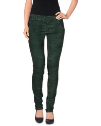 Темно-зеленые джинсы