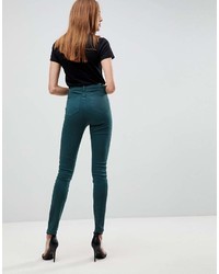 Темно-зеленые джинсы скинни