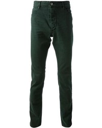 Темно-зеленые зауженные джинсы