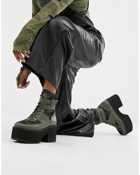 Темно-зеленые кожаные ботинки на шнуровке