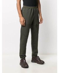 Мужские темно-зеленые спортивные штаны от Stone Island