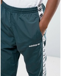 Мужские темно-зеленые спортивные штаны от adidas