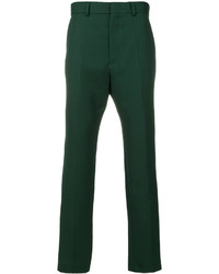 Темно-зеленые шерстяные брюки