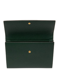 Темно-зеленый кожаный клатч от Gucci