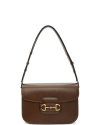 Темно-коричневая кожаная сумка через плечо от Gucci