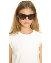 Женские темно-коричневые солнцезащитные очки с леопардовым принтом от Gucci