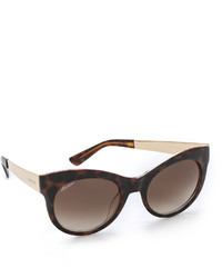 Женские темно-коричневые солнцезащитные очки с леопардовым принтом от Gucci