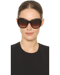 Женские темно-коричневые солнцезащитные очки от Oscar de la Renta