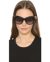 Женские темно-коричневые солнцезащитные очки от Oscar de la Renta