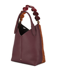 Темно-красная кожаная сумка-мешок от Anya Hindmarch