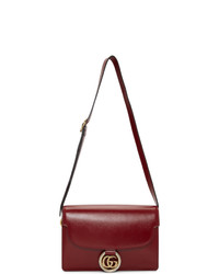Темно-красная кожаная сумка-саквояж от Gucci