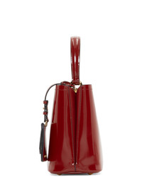 Темно-красная кожаная сумка через плечо от Prada