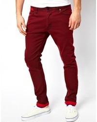 Темно-красные зауженные джинсы