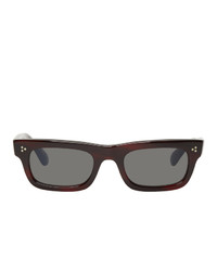 Мужские темно-красные солнцезащитные очки от Oliver Peoples