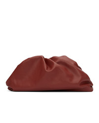 Темно-красный кожаный клатч от Bottega Veneta