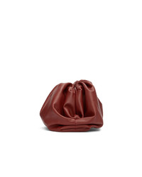 Темно-красный кожаный клатч от Bottega Veneta