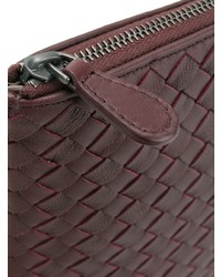 Темно-красный кожаный клатч от Bottega Veneta