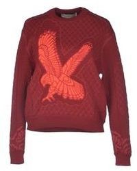 Темно-красный свитер с вышивкой