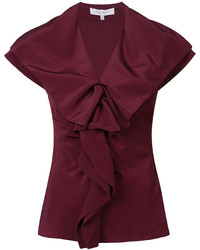 Темно-пурпурная шелковая блузка с рюшами от Carolina Herrera