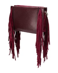 Темно-пурпурный замшевый клатч c бахромой от Givenchy