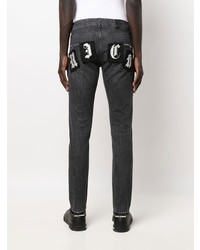 Мужские темно-серые рваные зауженные джинсы от John Richmond