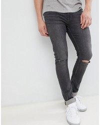 Мужские темно-серые рваные зауженные джинсы от Jack & Jones