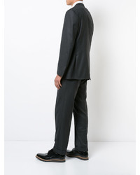 Темно-серый шерстяной костюм от Brioni