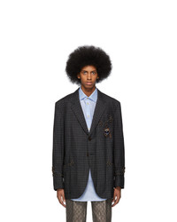 Мужской темно-серый шерстяной пиджак в клетку от Gucci