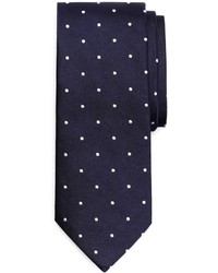 Темно-сине-белый галстук в горошек