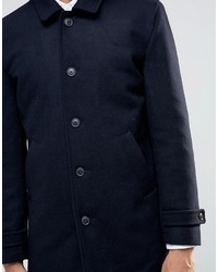 Темно-синее длинное пальто от Minimum
