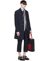 Темно-синее длинное пальто от Thom Browne