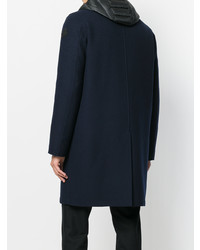 Темно-синее длинное пальто от Moncler