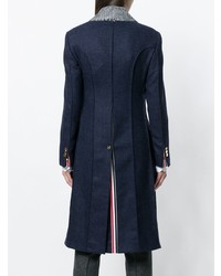 Темно-синее пальто с меховым воротником от Thom Browne