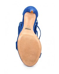 Темно-синие босоножки на каблуке от Schutz