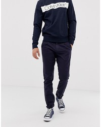 Темно-синие брюки чинос от Calvin Klein