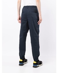 Темно-синие брюки чинос от Armani Exchange