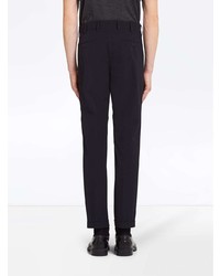 Темно-синие брюки чинос от Prada