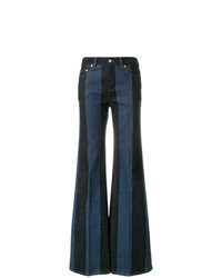 Темно-синие джинсы-клеш в вертикальную полоску