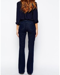 Темно-синие джинсы-клеш от Warehouse