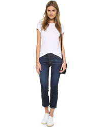 Темно-синие джинсы-клеш от AG Jeans