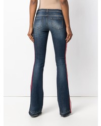 Темно-синие джинсы-клеш от Philipp Plein