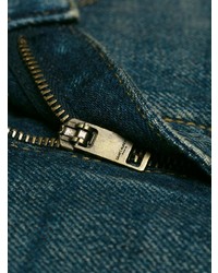 Темно-синие джинсы-клеш от Saint Laurent