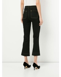 Темно-синие джинсы-клеш от Khaite