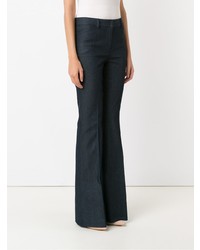 Темно-синие джинсы-клеш от Tufi Duek