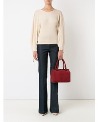 Темно-синие джинсы-клеш от Tufi Duek