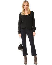 Темно-синие джинсы-клеш от Frame